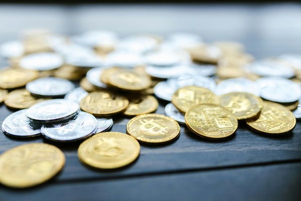 Silver and gold coins on a table