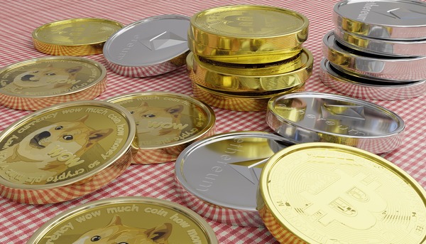 Stacks of gold and silver crypto coins