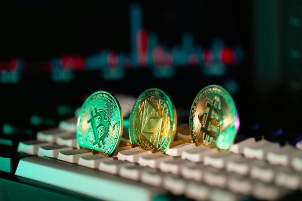 Crypto coins standing on a keyboard